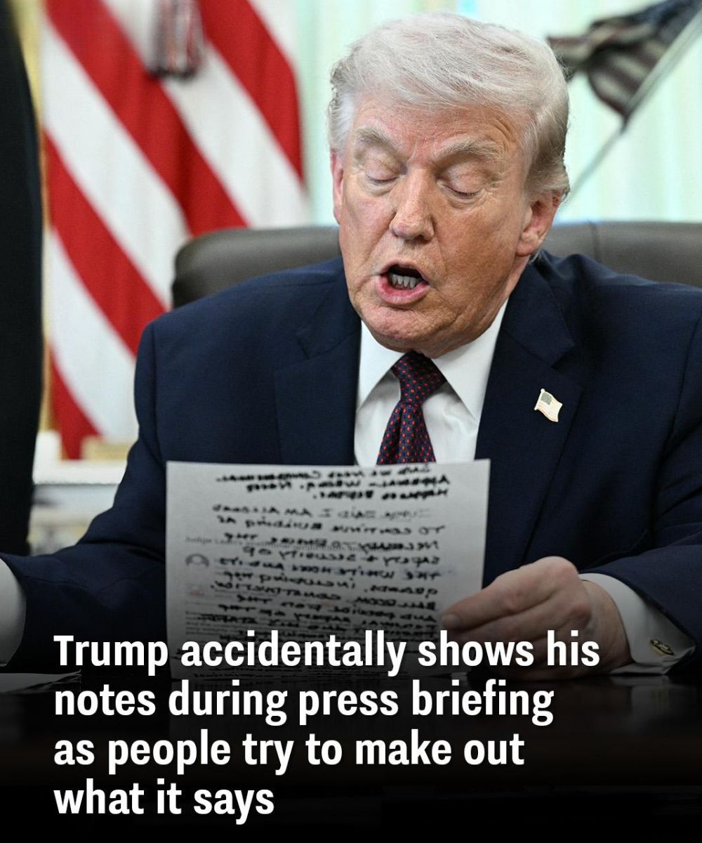 Trump shows his notes during press briefing as viewers try to see what it says